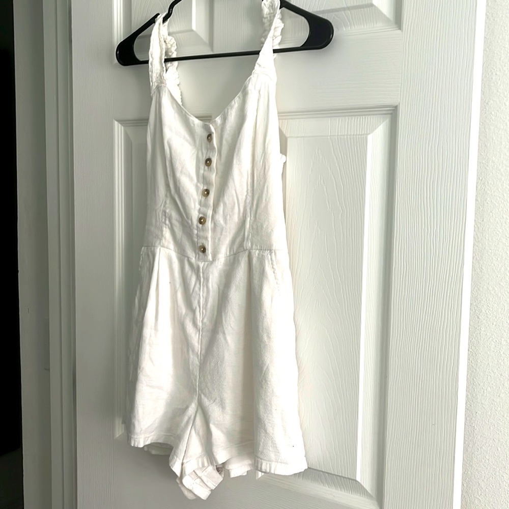 Only used one time, no stains, no rips or holes on the romper.